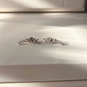 Silver tiffany & co earrings. Not sure the exact name of them, it was a gift.